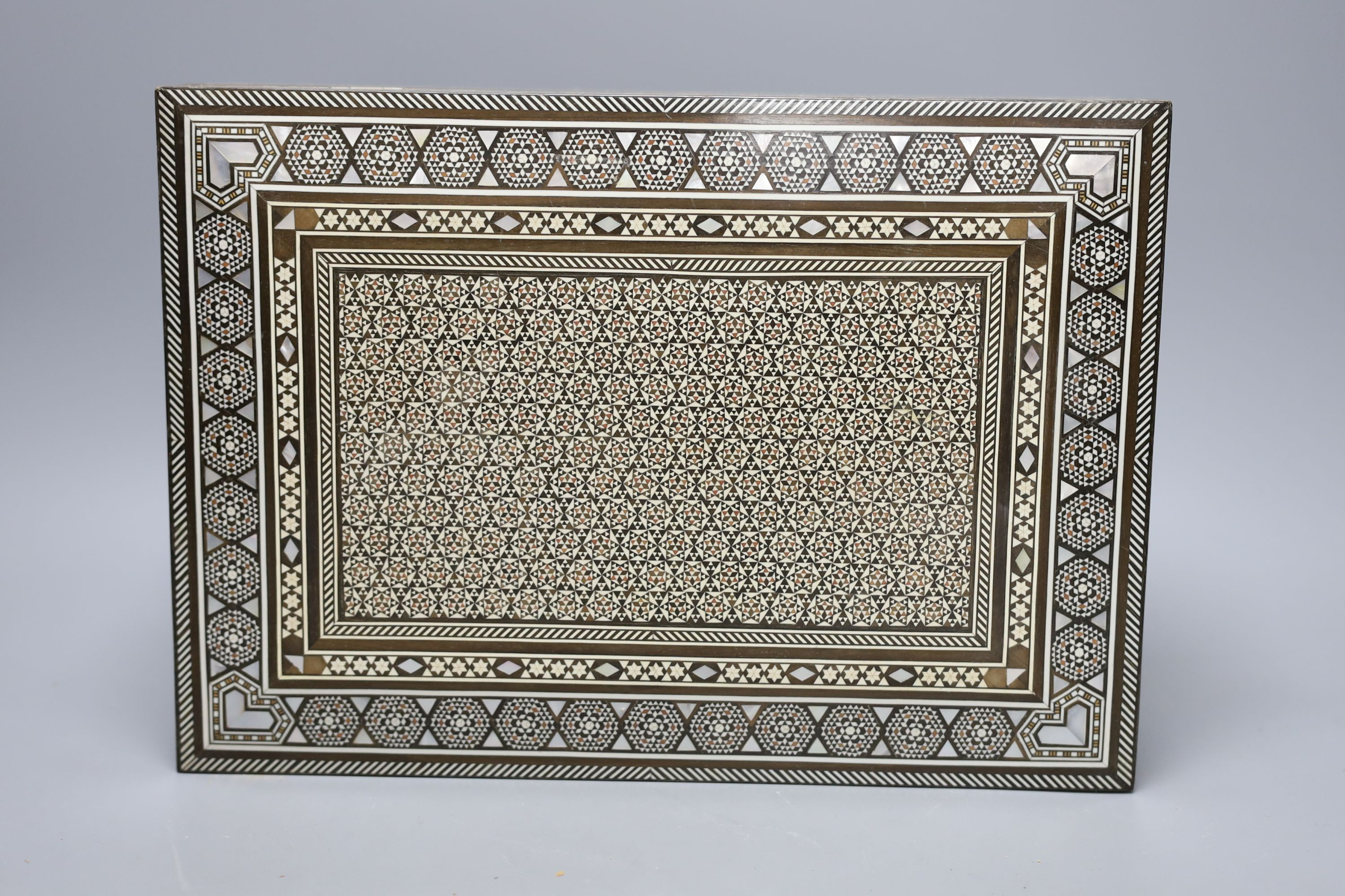 A Damascus jewellery casket and a pair of Victorian candlesticks, 43cm tall